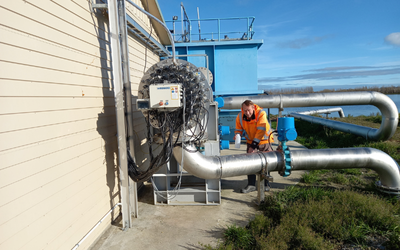 Wastewater treatment plant operator Geoff Armstrong checks water quality after it’s been through UV filters.
